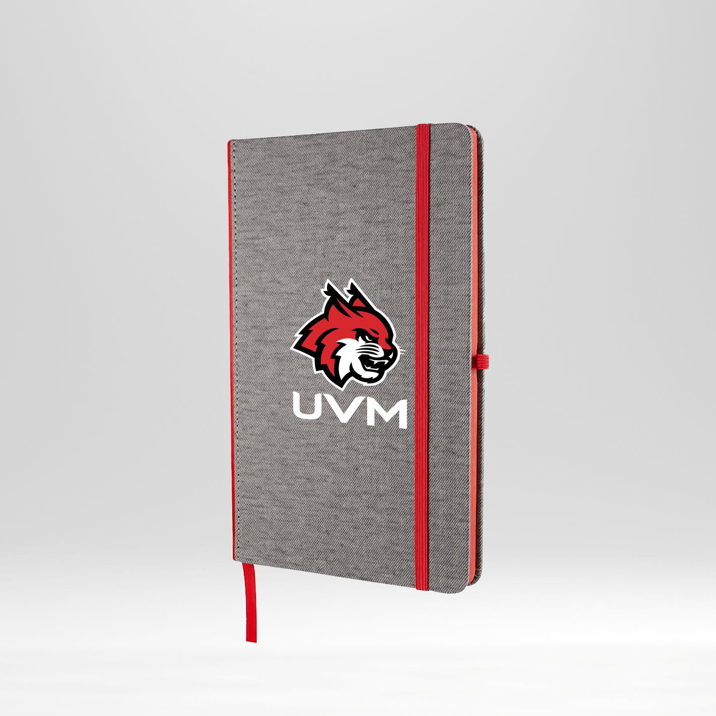 Libreta gris con detalles rojos UVM blanco