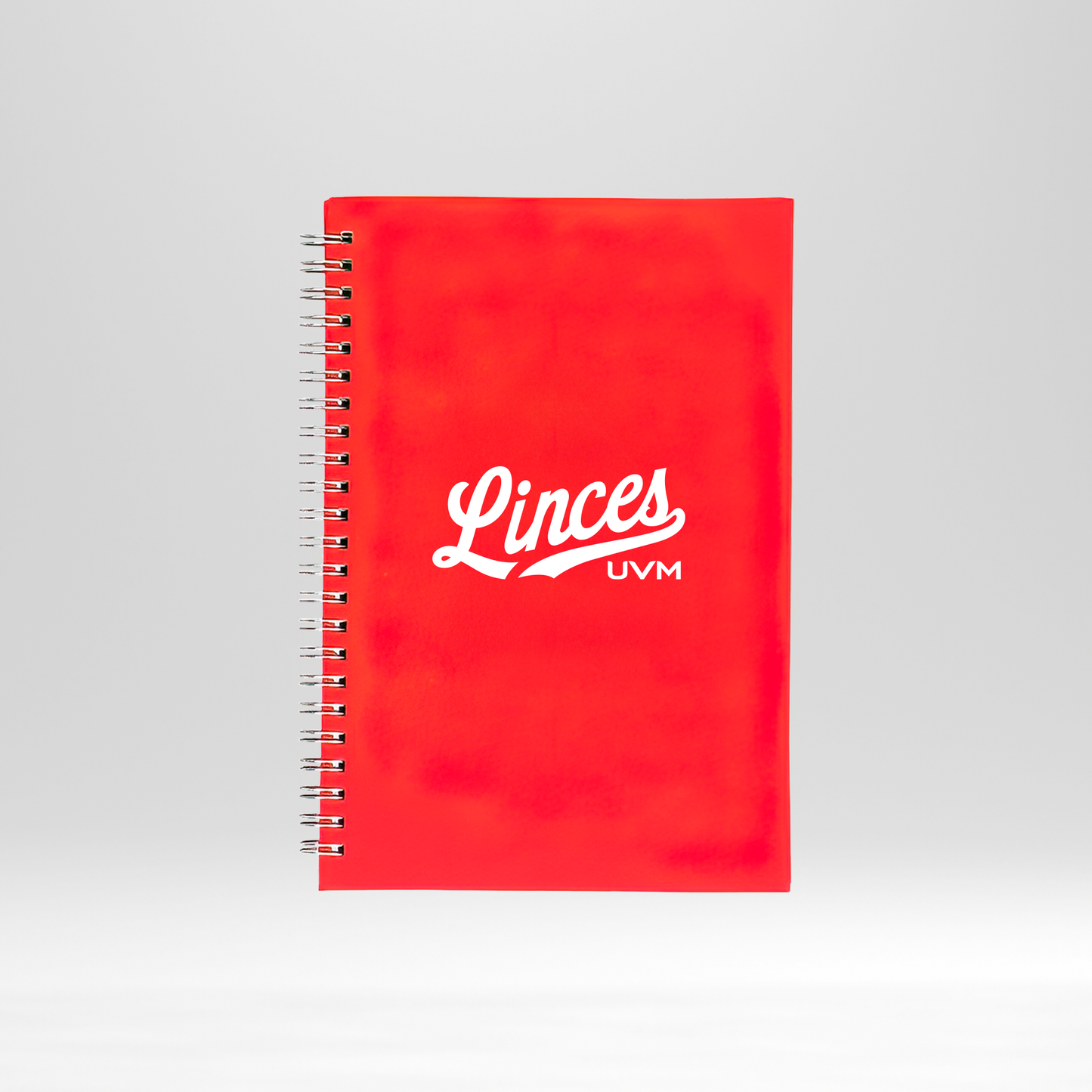 Libreta roja con engargolado linces UVM blanco