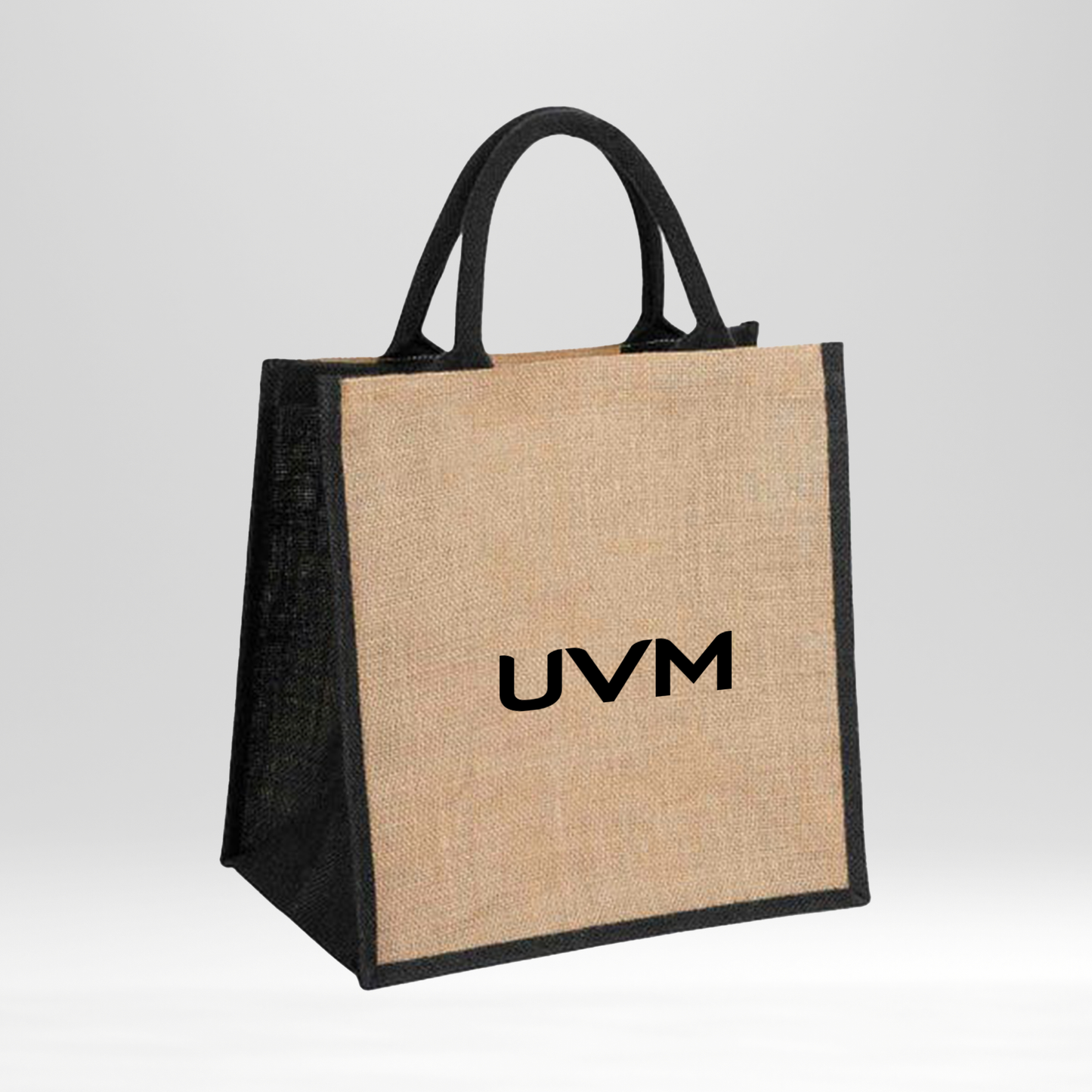 Bolsas crema y negra UVM
