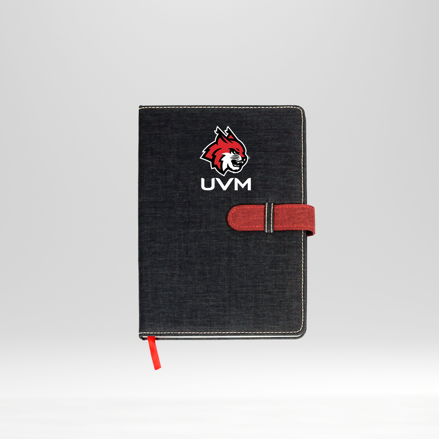 Libreta negra logo linces UVM blanco cierre rojo