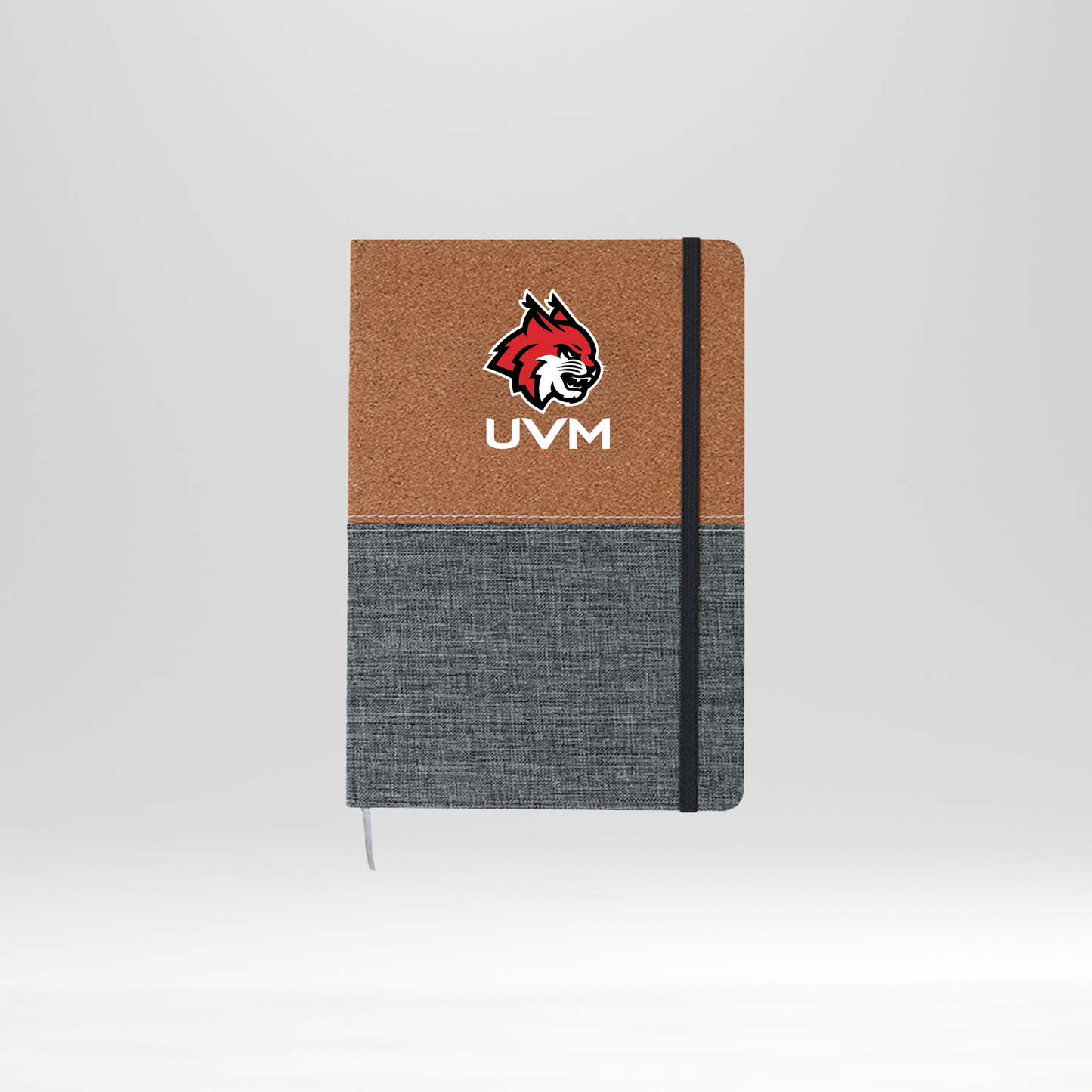 Libreta gris y beige logo linces UVM