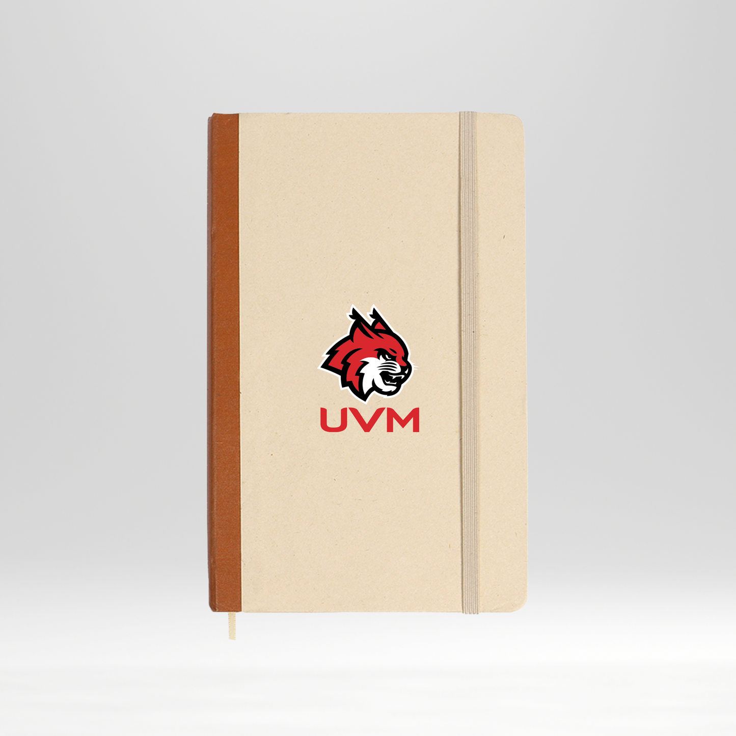 Libreta blanca con borde café logo linces UVM