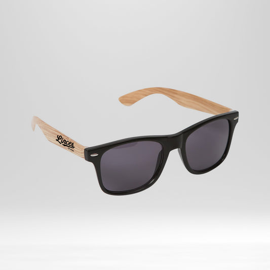 Lentes de sol madera logo linces UVM